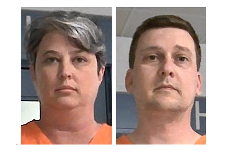 Side by side booking photos of Jonathan and Diana Toebbe in orange jumpsuits