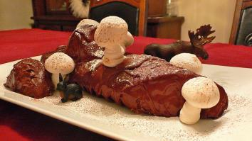 traditional french buche de noel christmas cake in a french patisserie  Stock Illustration