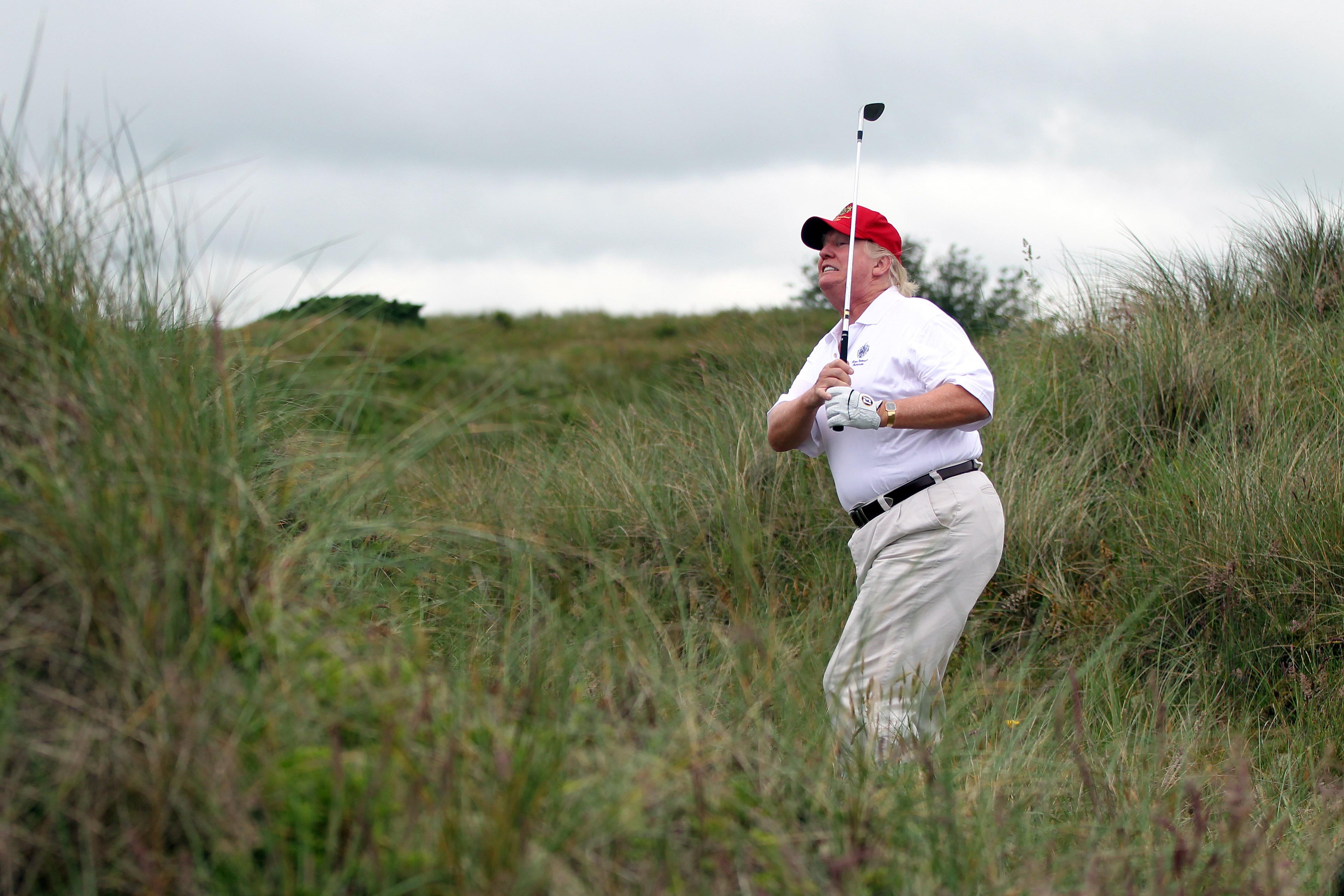 Donald Trump plays a round of golf.