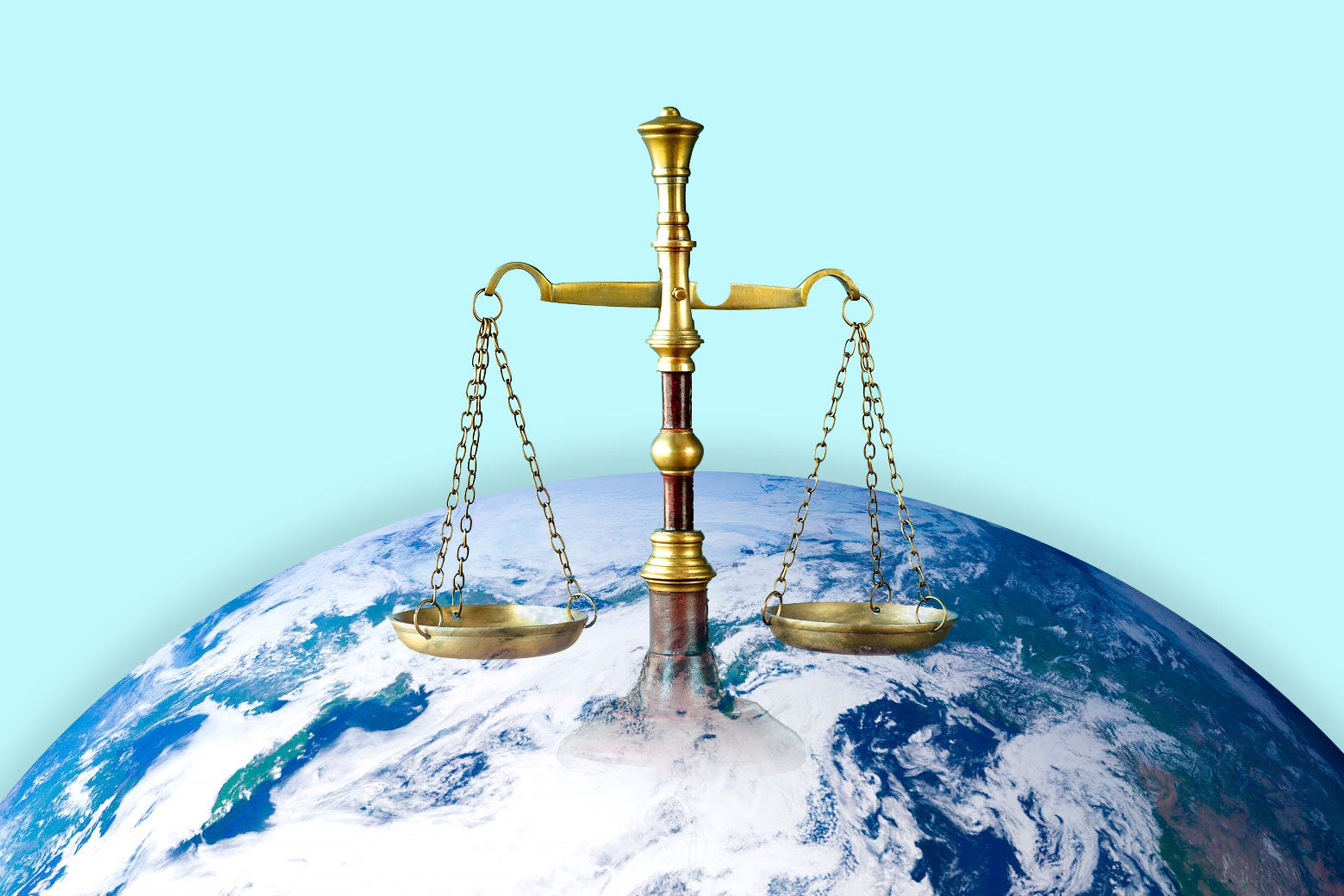 The scales of justice sitting on top of the Earth.