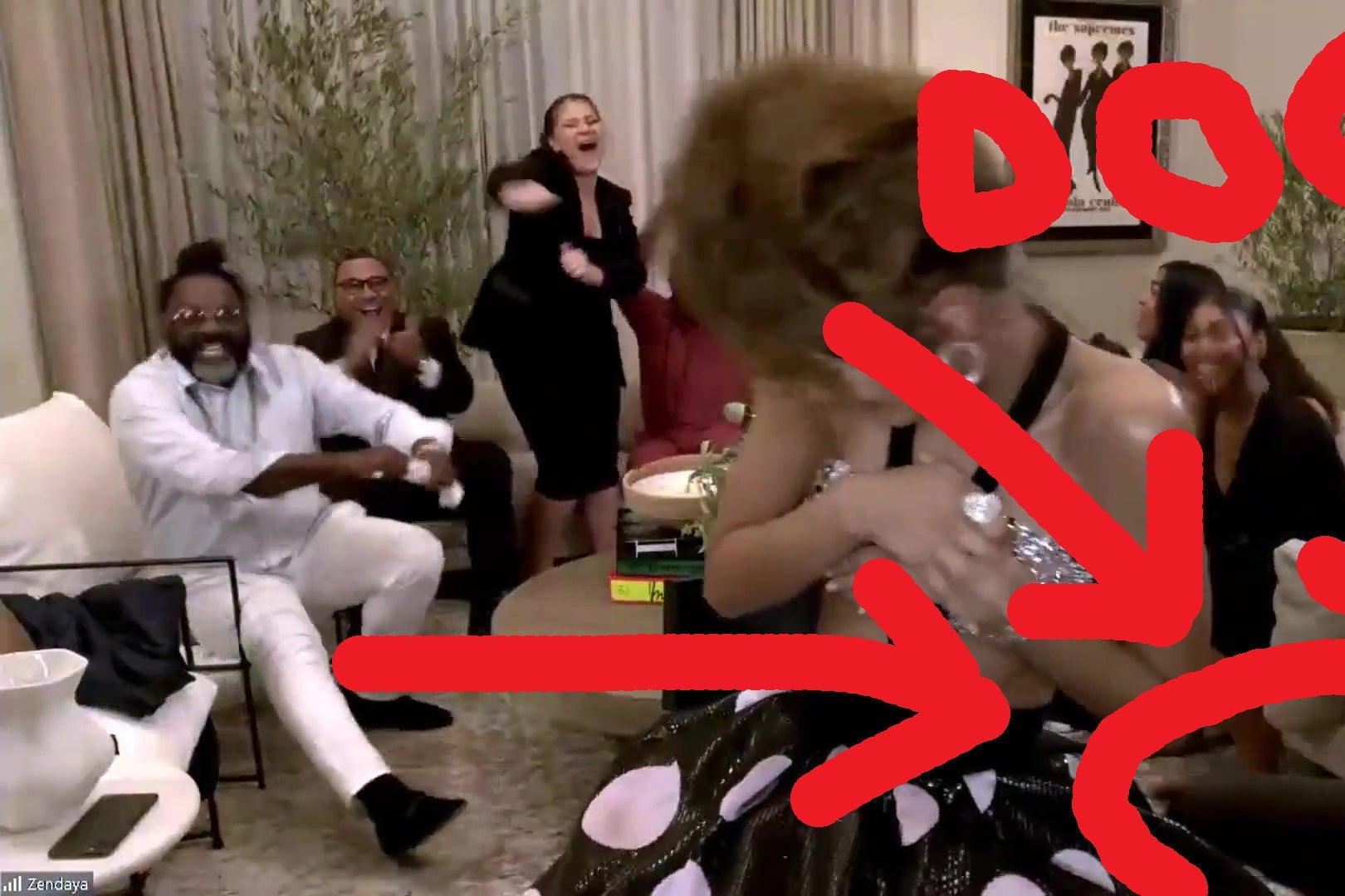Zendya accepting her Emmy, except in this version, the dog in the lower right corner is identified with giant red arrows.