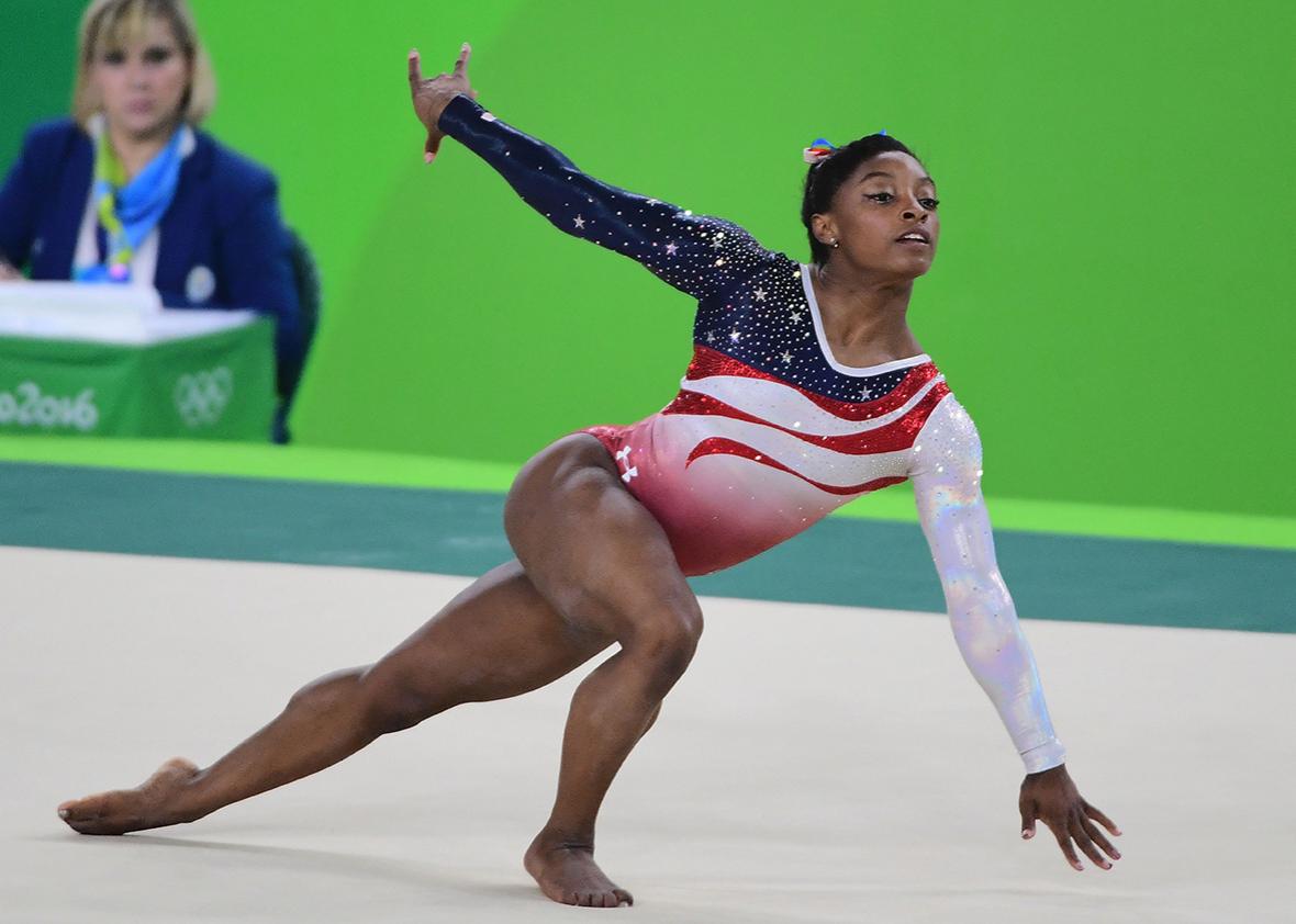US gymnast Simone Biles competes in the Floor event during the women's team final Artistic Gymnastics at the Olympic Arena during the Rio 2016 Olympic Games in Rio de Janeiro on August 9, 2016. 