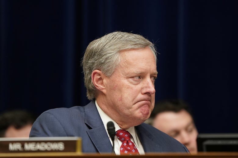 Rep. Mark Meadows reacts while listening to fellow Representative Rashida Tlaib (D-MI) speak during the testimony of Michael Cohen at a House Committee on Oversight and Reform hearing on Capitol Hill in Washington on February 27, 2019.