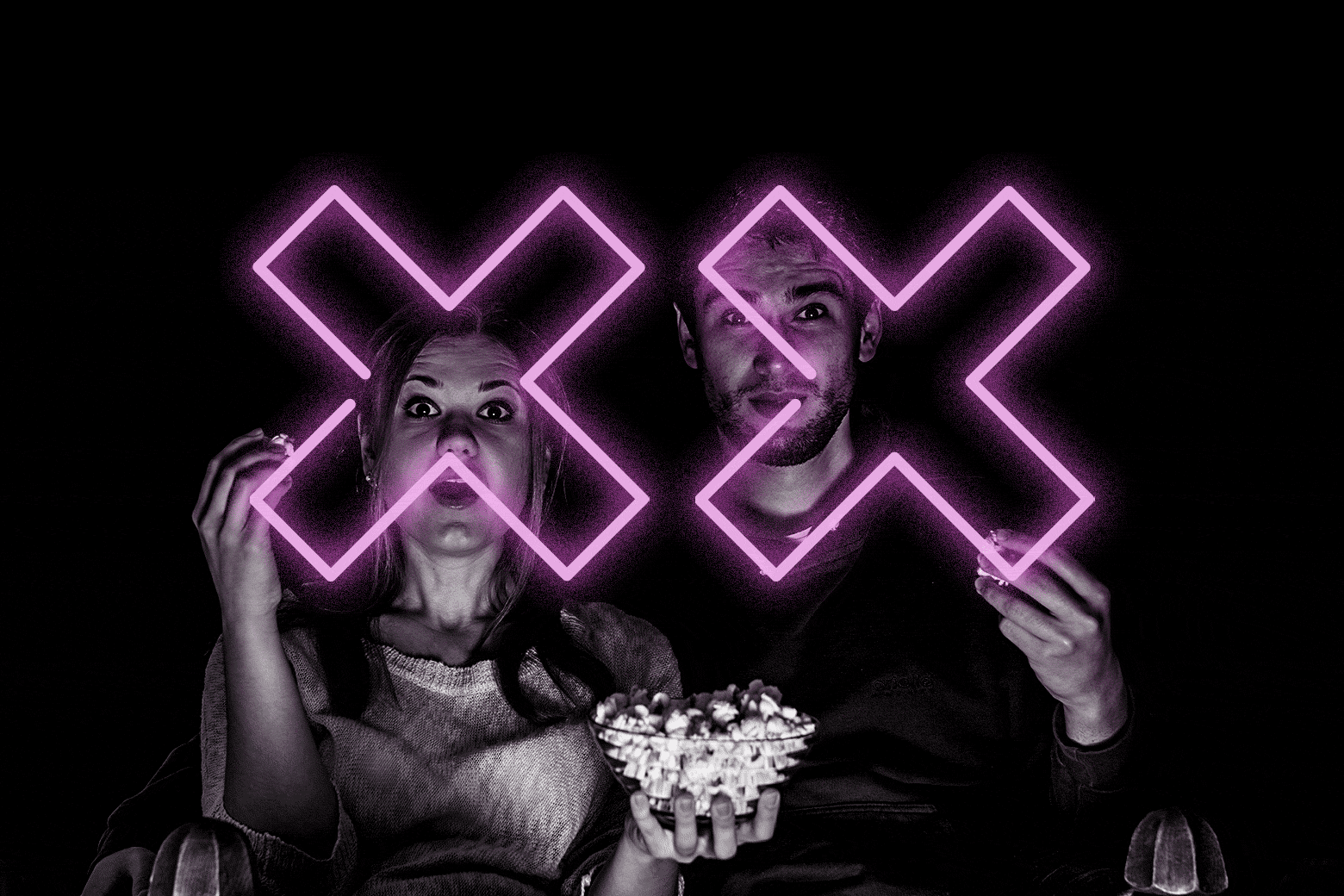 Couple with popcorn. Two "X"s are overlayed on top of them.