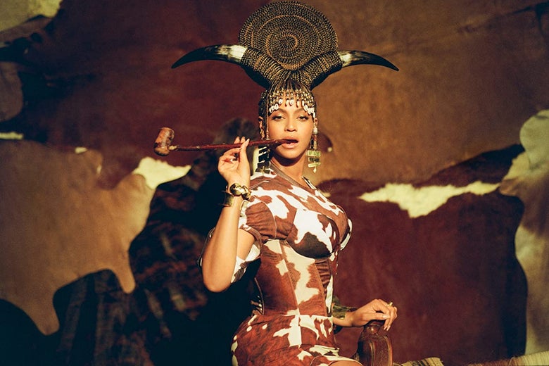 Beyoncé, on a horse, with a pipe, in cowprint
