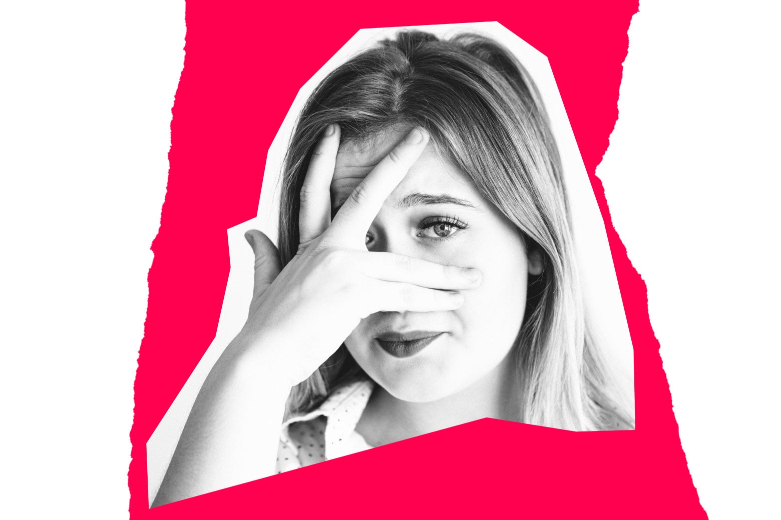 A woman hiding her eyes as if looking away from a car crash.