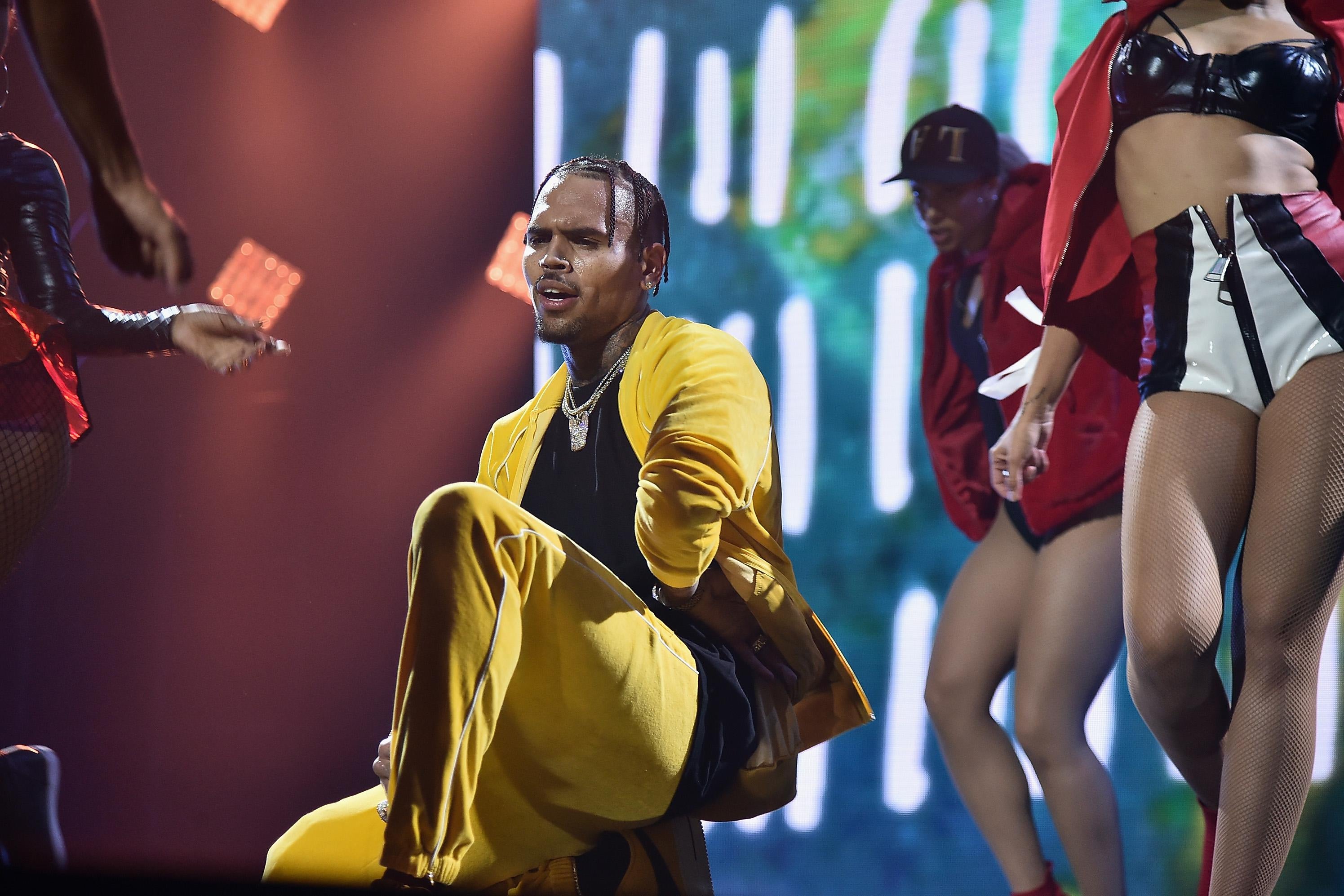 NEW YORK, NY - OCTOBER 17:  Chris Brown performs onstage during TIDAL X: Brooklyn at Barclays Center of Brooklyn on October 17, 2017 in New York City.  (Photo by Theo Wargo/Getty Images for TIDAL)