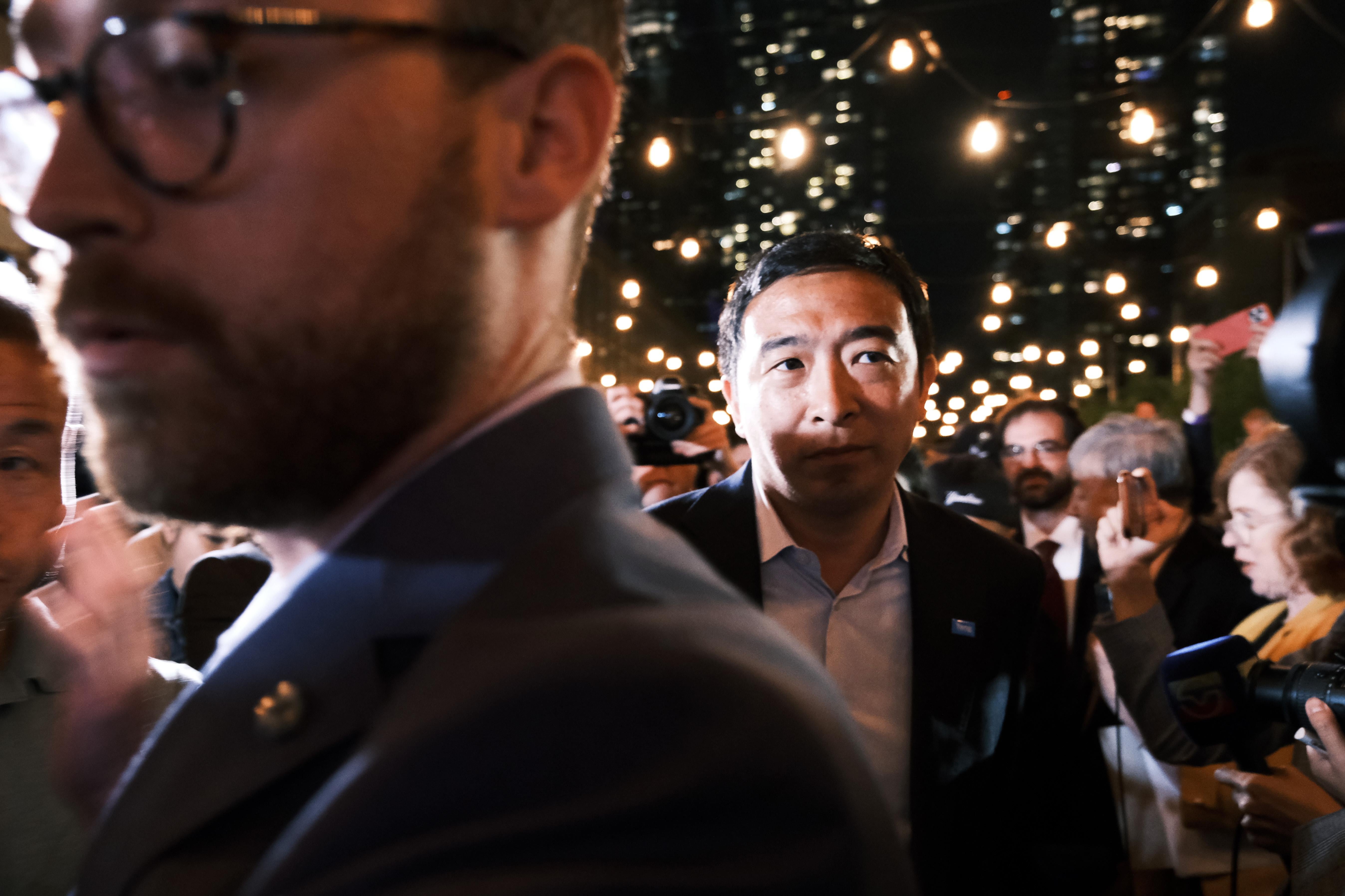 NEW YORK, NEW YORK - JUNE 22: Mayoral candidate Andrew Yang greets supporters at a Manhattan hotel as he concedes in his campaign for mayor on June 22, 2021 in New York City. Early polls showed Yang, who has never held a political office before, far behind other candidates in the Democratic primary. Ranked choice voting is being used for the first time, a system that lets voters prioritize more than one candidate on their ballot. The winner of the Democratic primary will face off against the Republican candidate in the fall (Photo by Spencer Platt/Getty Images)