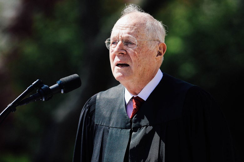 Anthony Kennedy speaking into a microphone