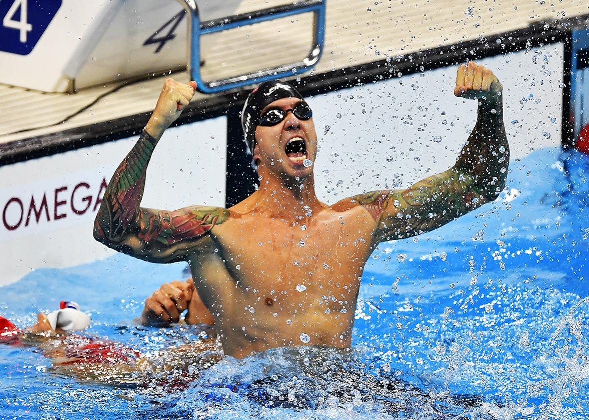 Anthony Ervin of the U.S.A reacts next to second placed Florent Manaudou of France after he won the Men's 50m Freestyle Final during the swimming event at the Rio 2016 Olympic Games at the Olympic Aquatics Stadium in Rio de Janeiro on August 12, 2016 in Rio de Janeiro, Brazil.  