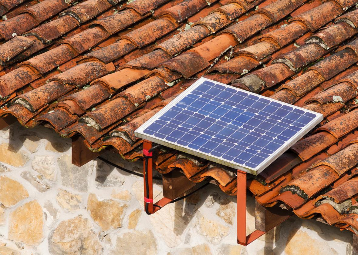 Solar panel on terra cotta roof.