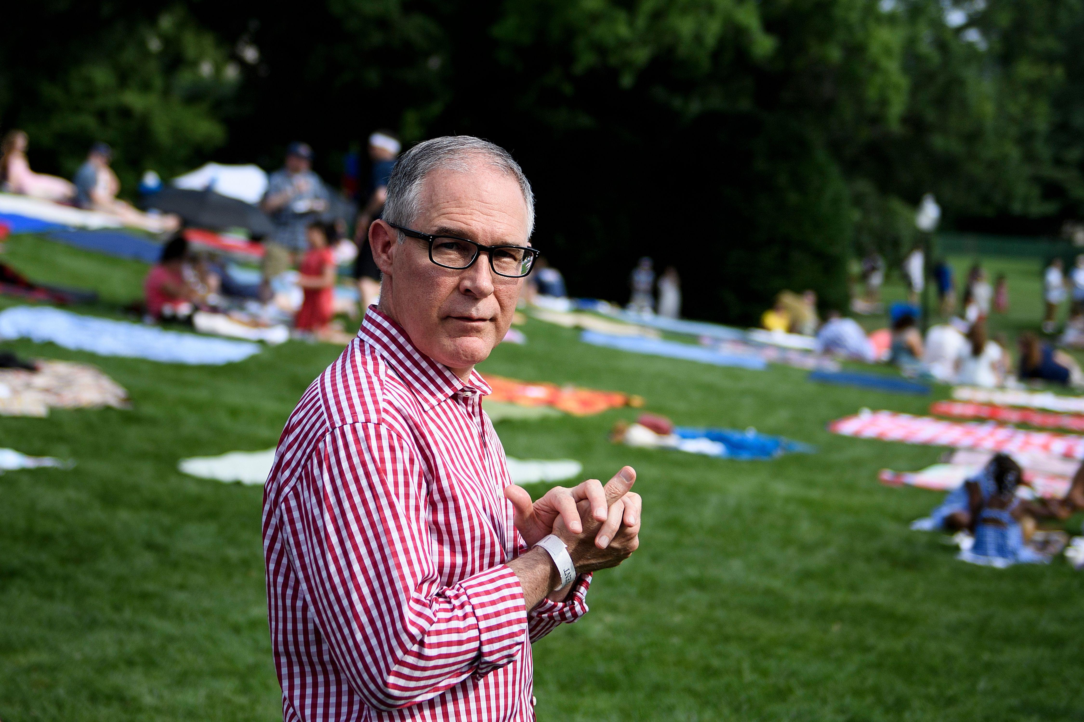 Scott Pruitt walks during a picnic for military families on the South Lawn of the White House July 4, 2018 in Washington, DC. 