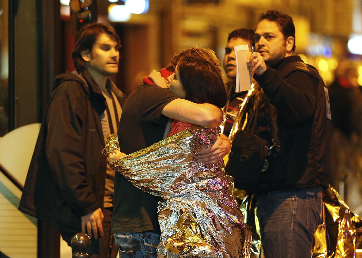 Paris attack people hugging
