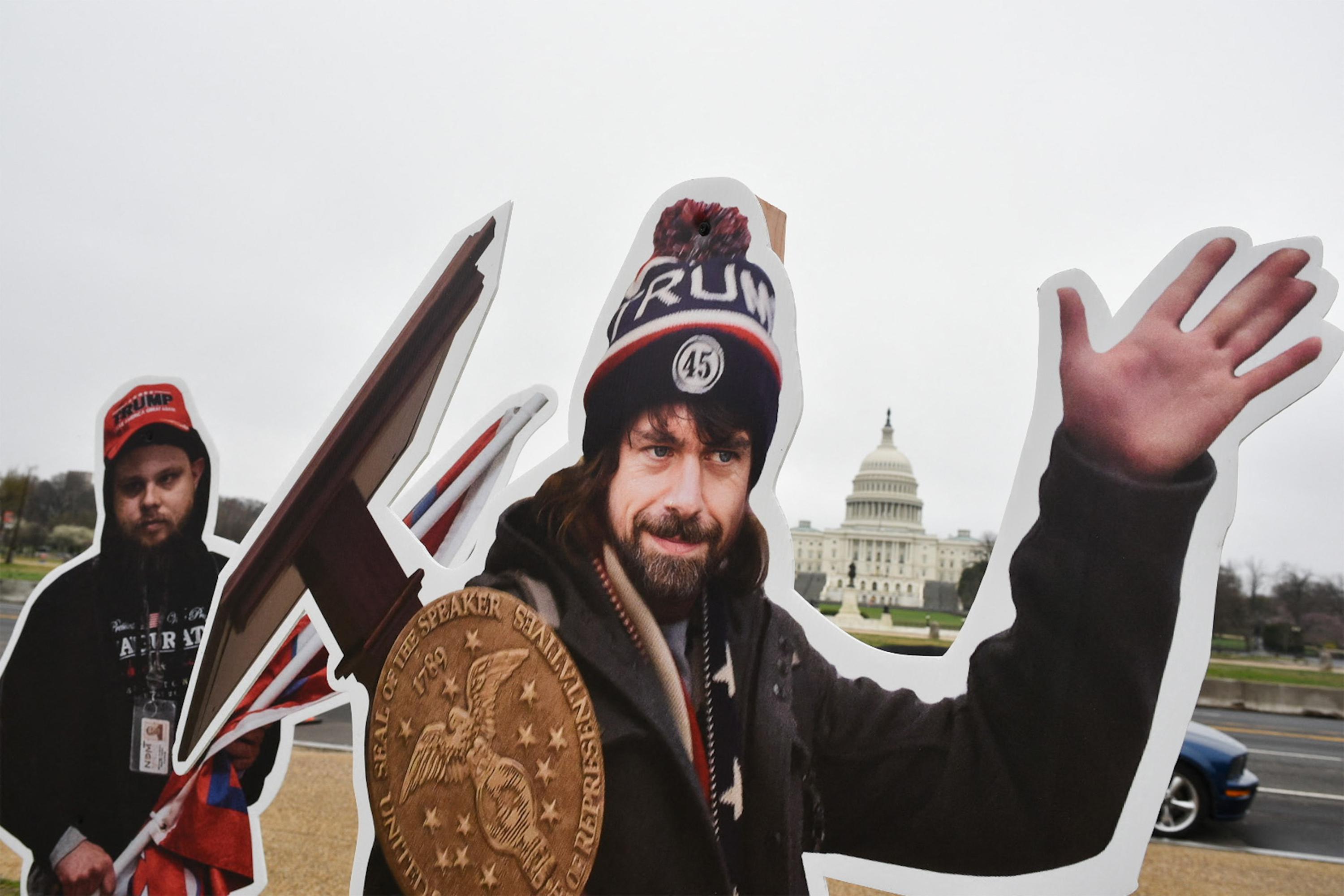 With the Capitol in the background, Jack Dorsey's face is on that of a man wearing a Trump hat and waving as he carries a lectern.
