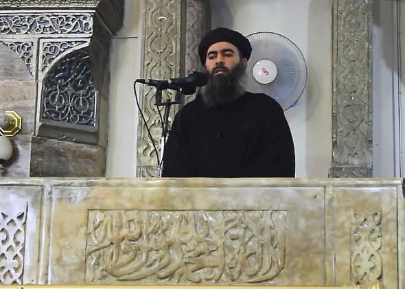 Abu Bakr al-Baghdadi preaching during Friday prayer at a mosque in Mosul.