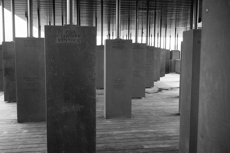 Markers showing the names of lynching victims at the National Memorial For Peace And Justice in Montgomery, Alabama.