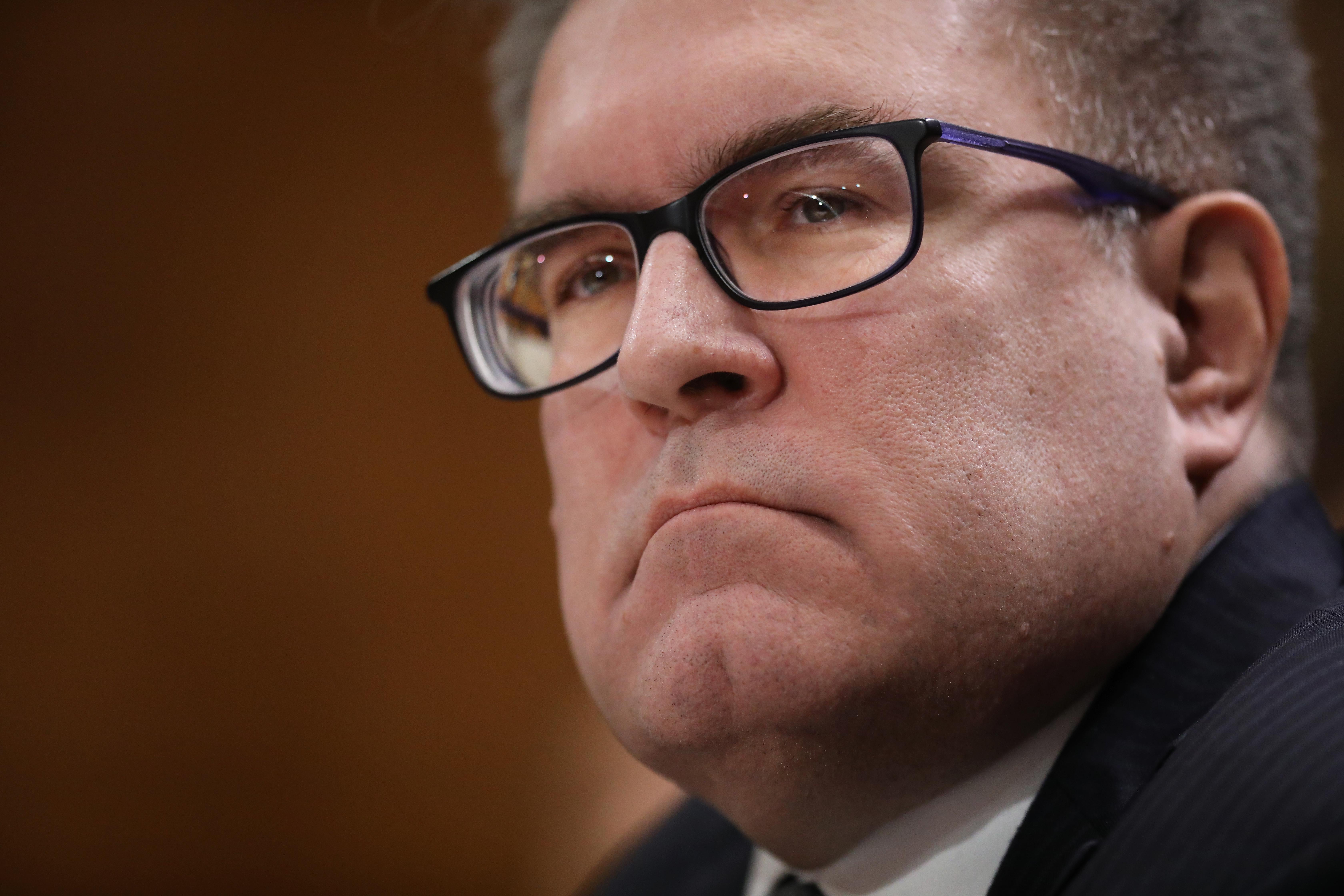 Andrew Wheeler frowns.
