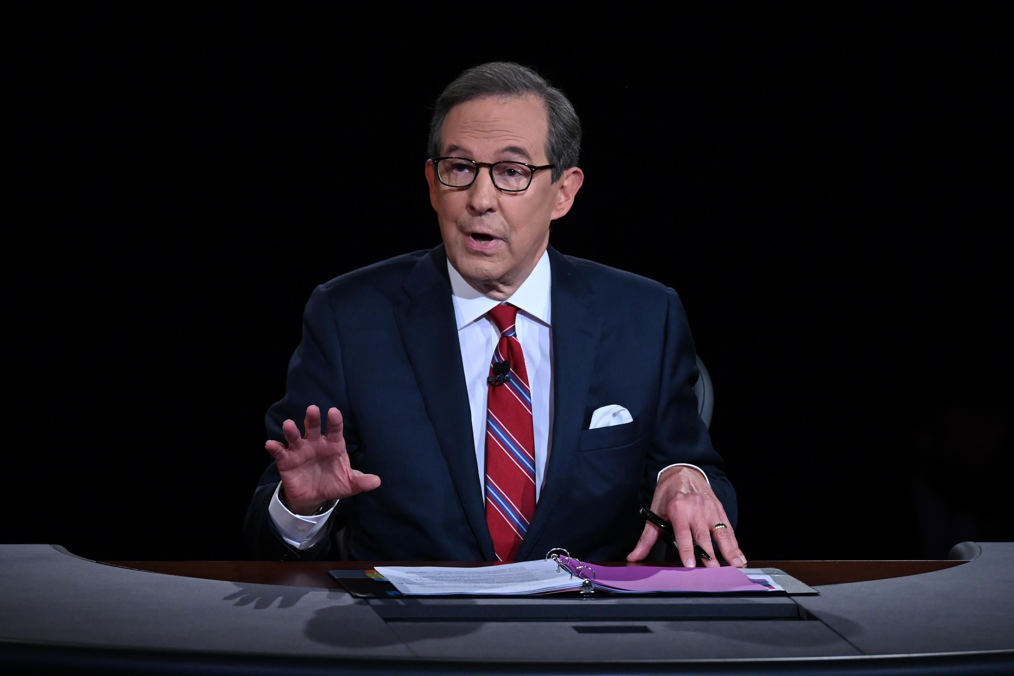 Fox News anchor Chris Wallace directs the first presidential debate between Donald Trump and Joe Biden at Case Western Reserve University on September 29, 2020 in Cleveland, Ohio.