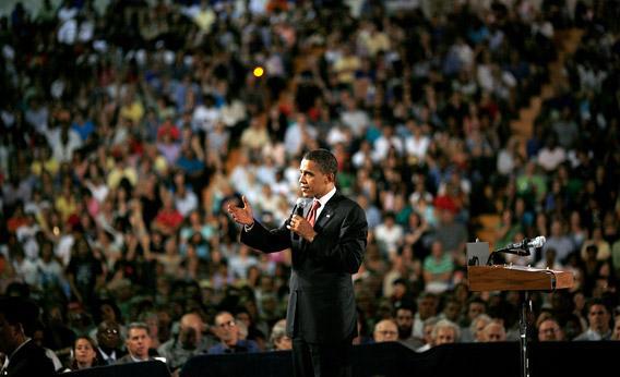 Then Democratic presidential candidate Sen. Barack Obama speaks at a town hall meeting in July 2008 in Virginia.