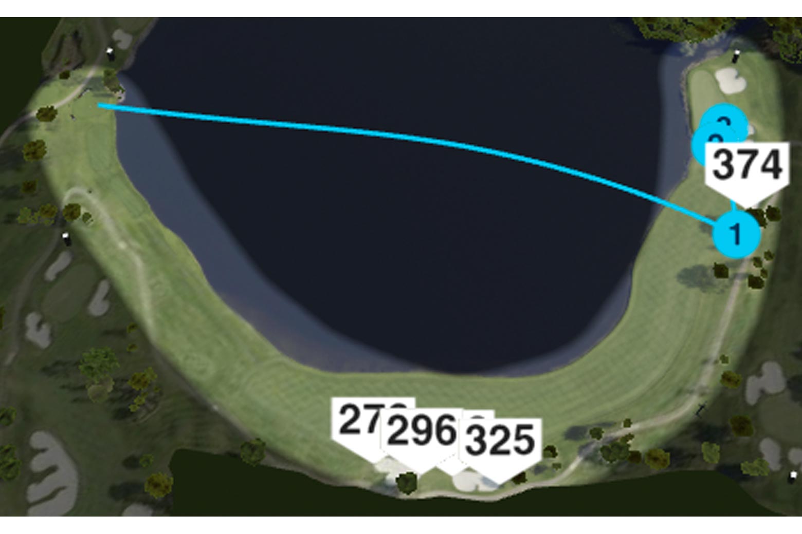 An aerial view of the dogleg sixth hole with the trajectory of DeChambeau’s drive cutting across the wide part of the water.