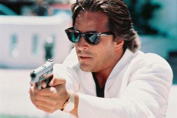 Don Johnson in a signature white suit, on "Miami Vice."