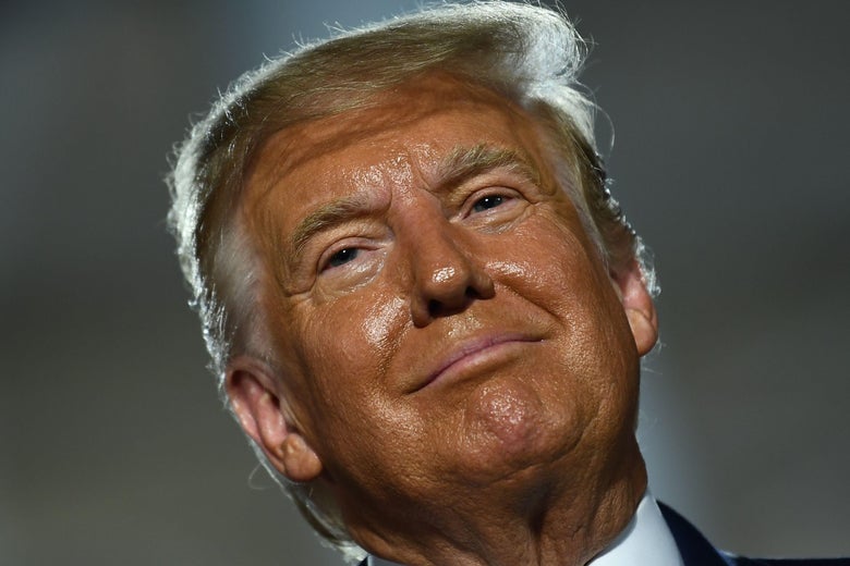 Close-up on Trump's face, looking sweaty and tanned