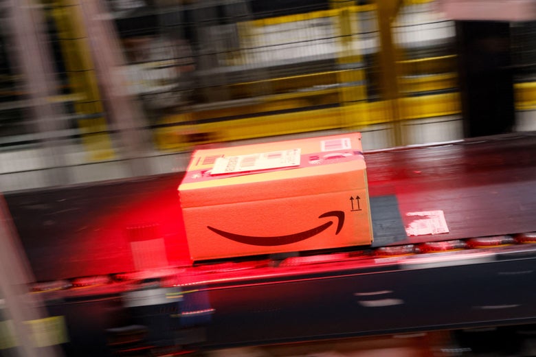 Action shot of an Amazon package on a conveyor belt in an Amazon warehouse in France