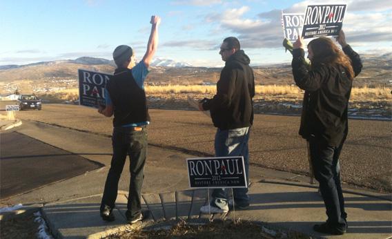 Supporters of Ron Paul direct cars into the parking lot before a rally in Elko, Nev.
