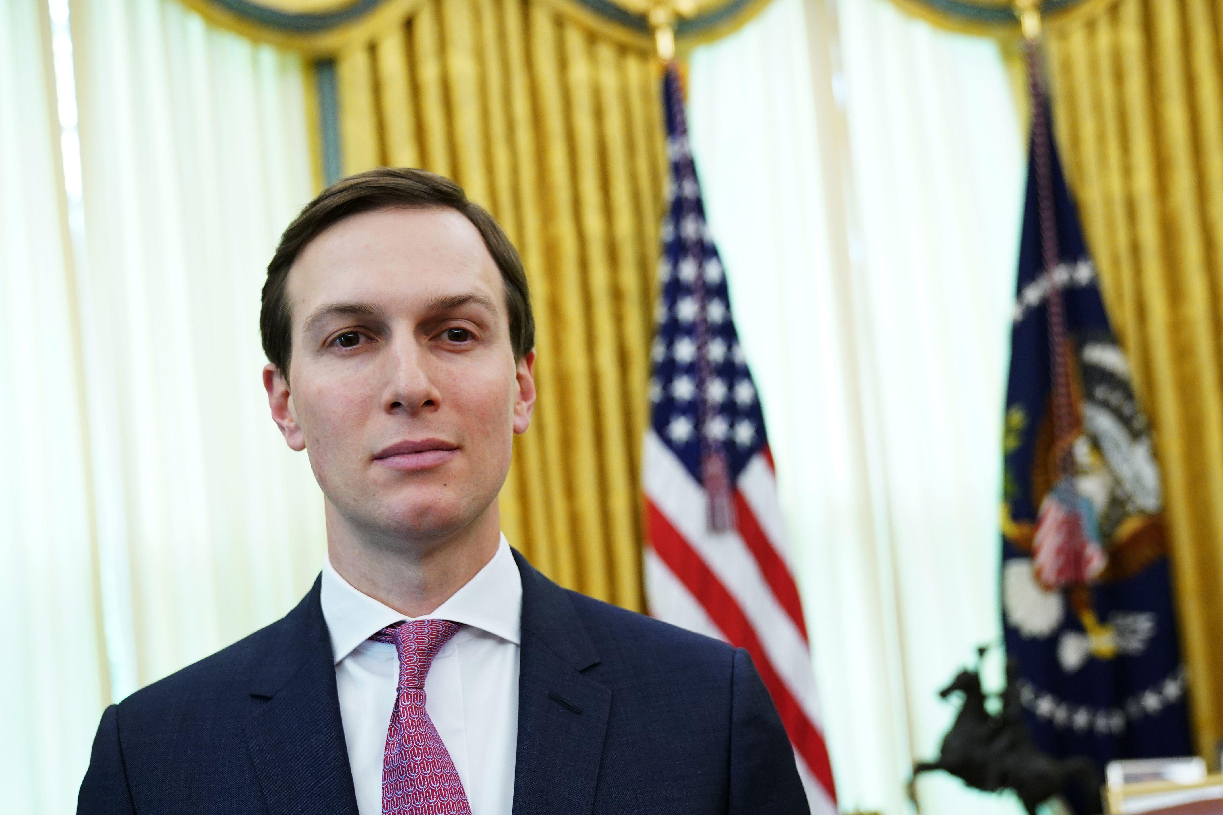 Jared Kushner smirks in a close-up photo in the Oval Office.