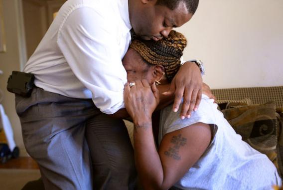 Priscilla Daniels, wife of victim Arthur Daniels, is comforted by Lynnell Humphrey, who came to assist the family with arrangements on September 17,  2013 in Washington, DC.