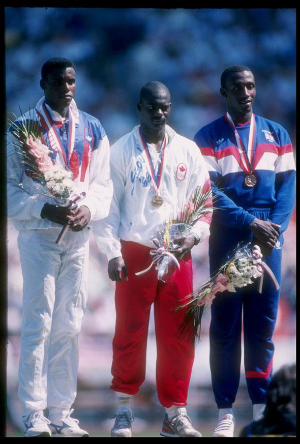 Carl Lewis of the United States (left) stands with Ben Johnson of Canada (center) and Linford Christie of Great Britain after completion of the 100 meter final at the Summer Olympics in Seoul, South Korea.