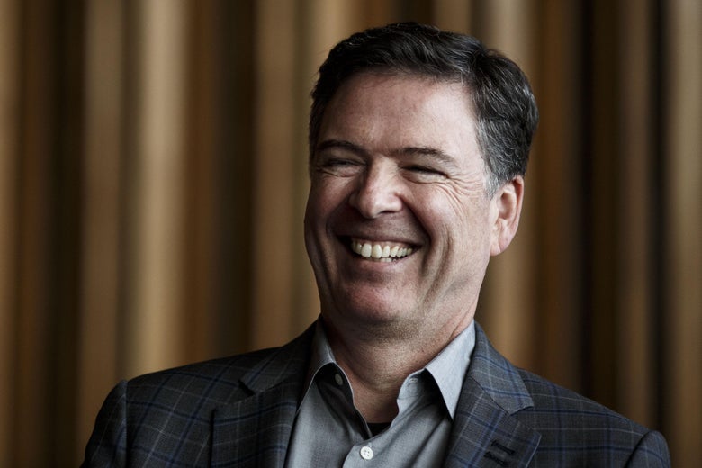 Former FBI Director James Comey talks backstage before a panel discussion about his book A Higher Loyalty on June 19, 2018 in Berlin, Germany.