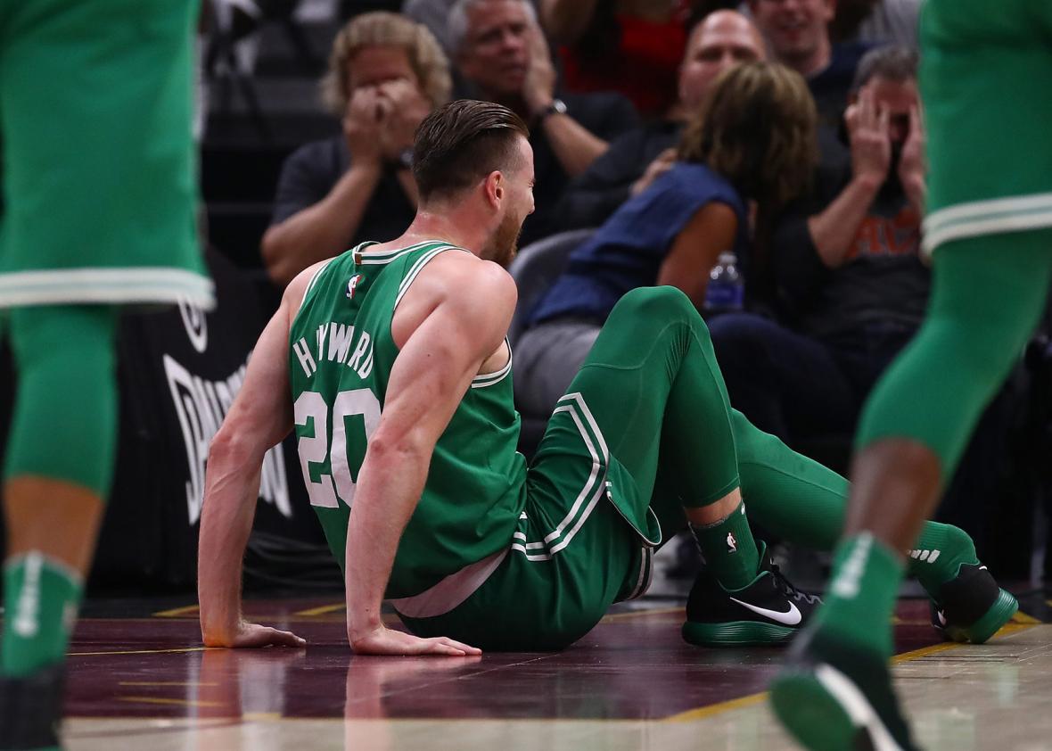 Gordon Hayward #20 of the Boston Celtics is sits on the floor after being injured.
