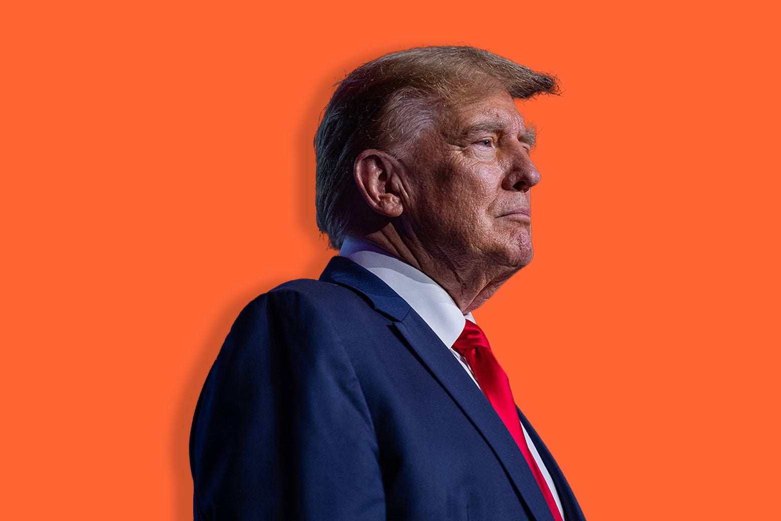 A solemn-looking Donald Trump in side profile, against an orange background.