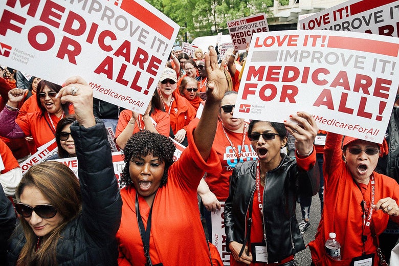Protesters supporting “Medicare for All” hold a rally outside PhRMA headquarters.