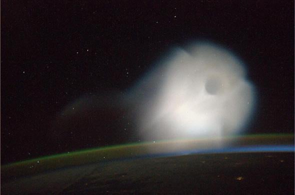 ISS astronaut photo of cloud of light