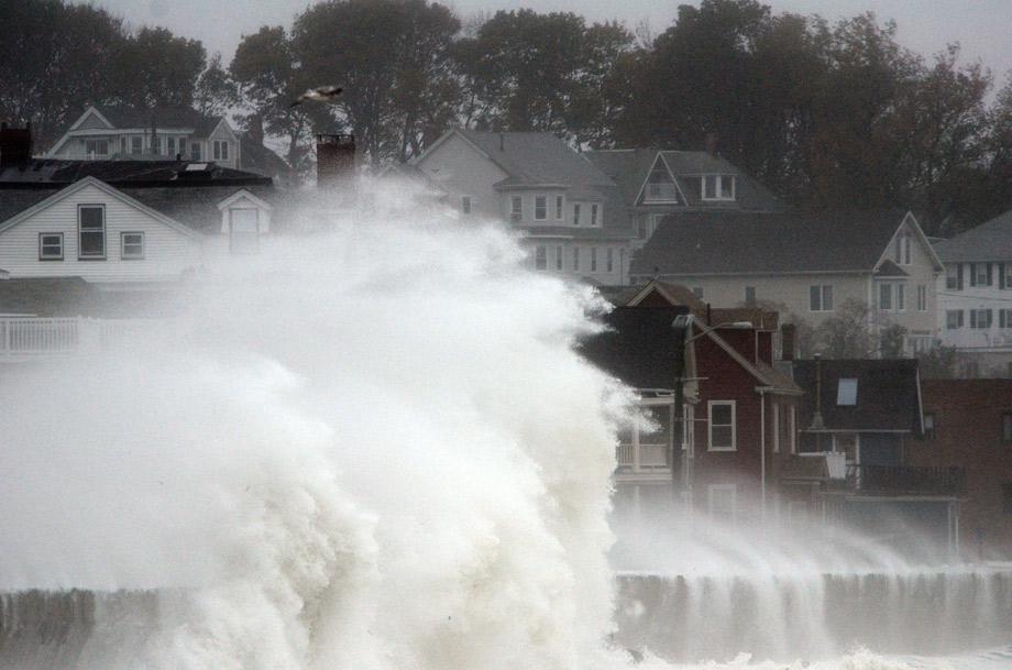 Waves crash over Winthrop Shore Drive as Hurricane Sandy comes up the coast on Monday in Winthrop, Massachusetts.
