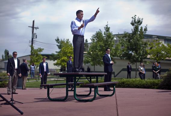 Photos Of Mitt Romney Standing On Tables Chairs And A Cooler