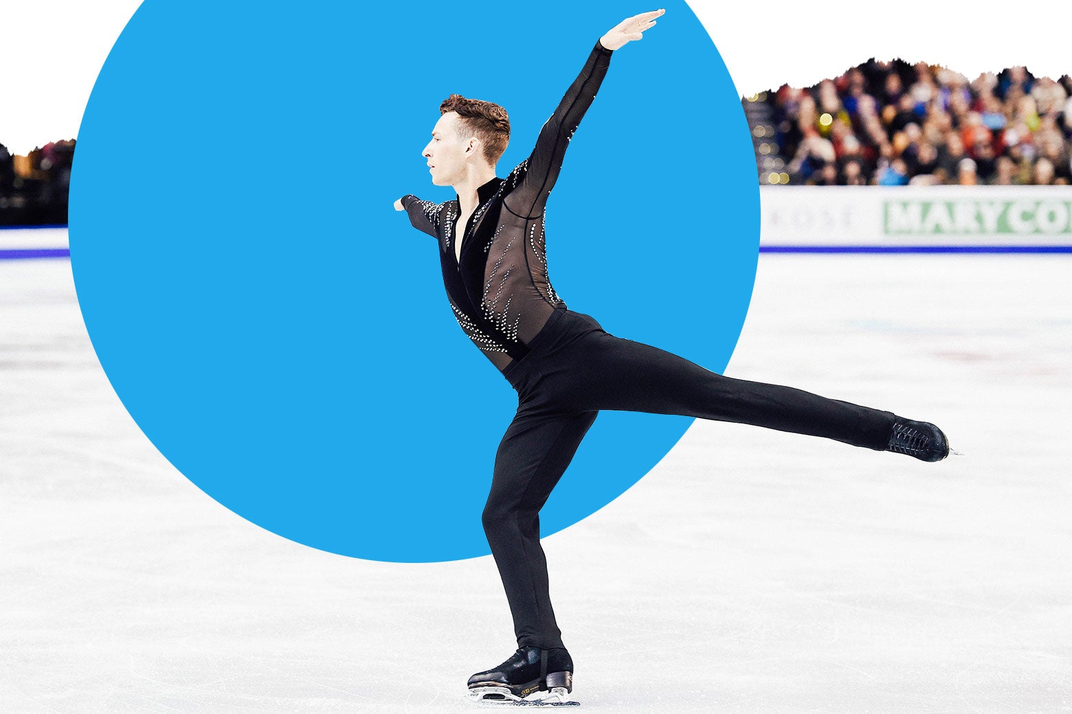 Adam Rippon skates in a black mesh long-sleeve top.