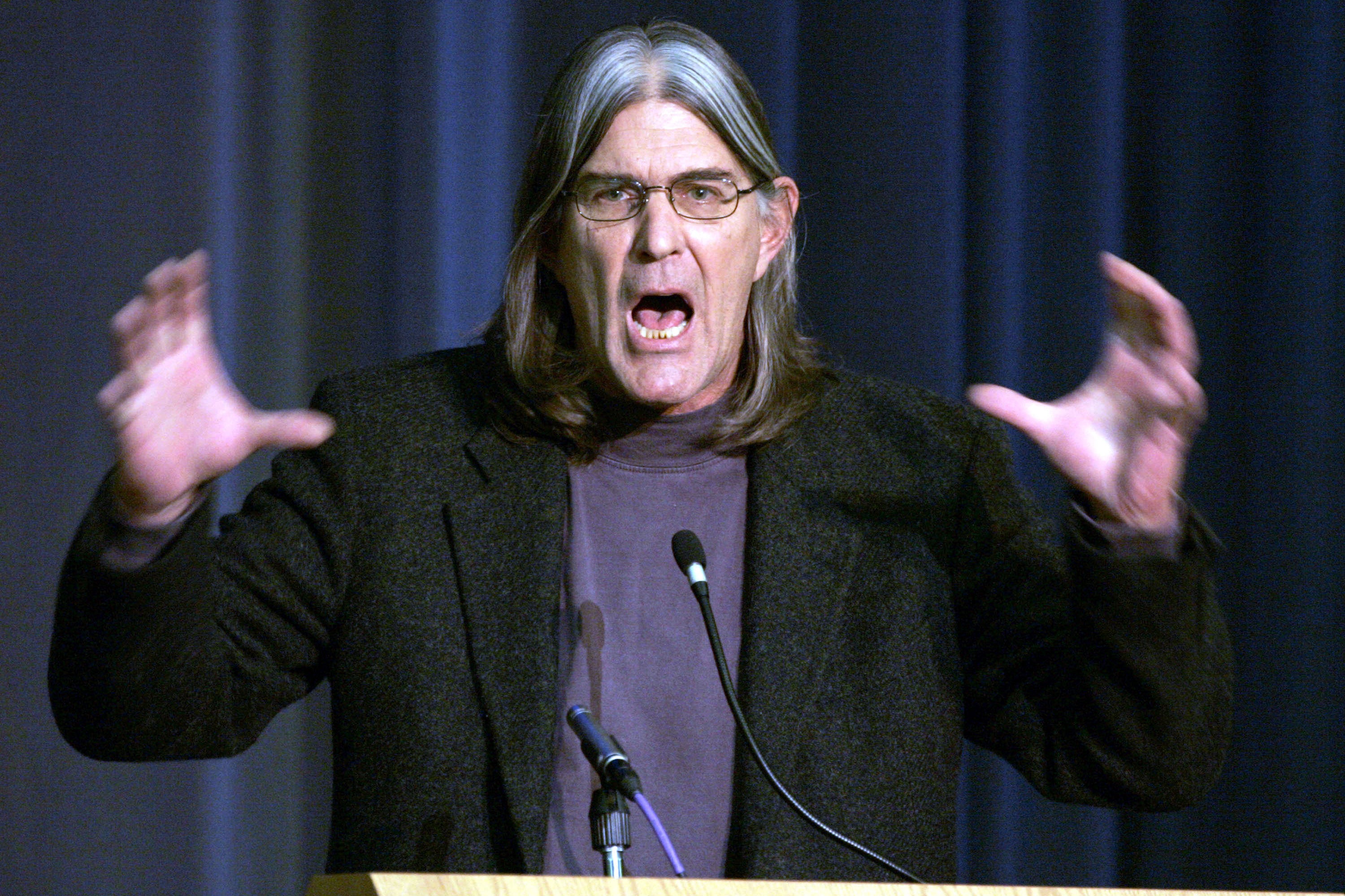 University of Colorado professor Ward Churchill gesticulating in a threatening manner.