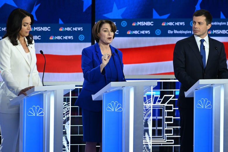 Democratic presidential hopefuls Representative for Hawaii Tulsi Gabbard (L), Minnesota Senator Amy Klobuchar (C) and Mayor of South Bend, Indiana, Pete Buttigieg (R) participate in the fifth Democratic primary debate of the 2020 presidential campaign season co-hosted by MSNBC and The Washington Post at Tyler Perry Studios in Atlanta, Georgia on November 20, 2019. (Photo by SAUL LOEB / AFP) (Photo by SAUL LOEB/AFP via Getty Images)