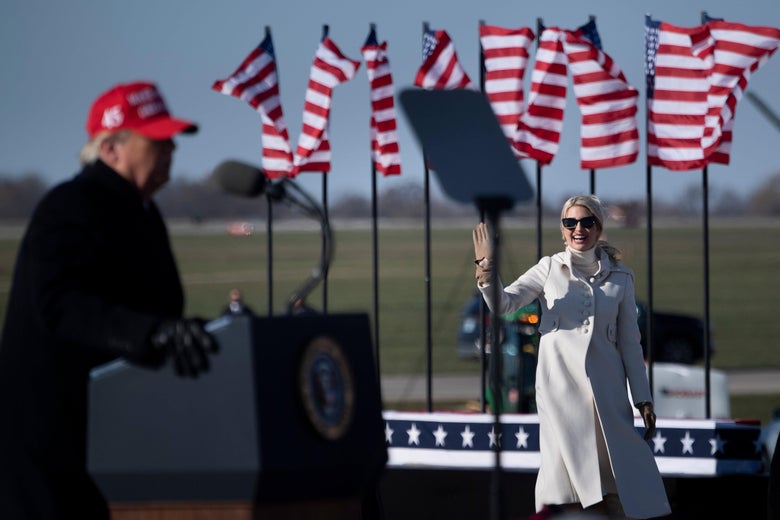 Trump speaks at a podium in the foreground while Ivanka smiles and waves in the background.