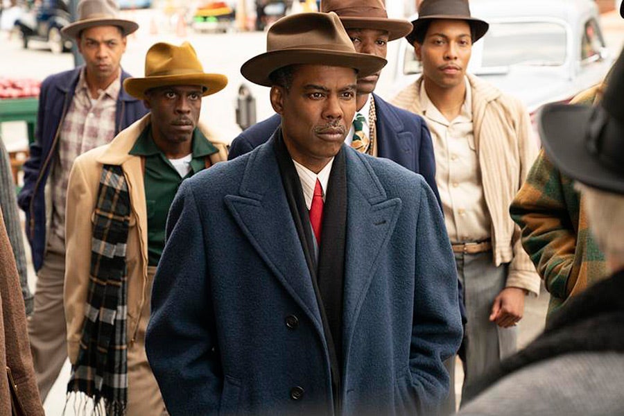 Chris Rock and four other Black men in period dress.