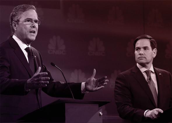 Republican Presidential hopeful Jeb Bush (L) speaks as Marco Rubio looks on during the CNBC Republican Presidential Debate, October 28, 2015 at the Coors Event Center at the University of Colorado in Boulder, Colorado.