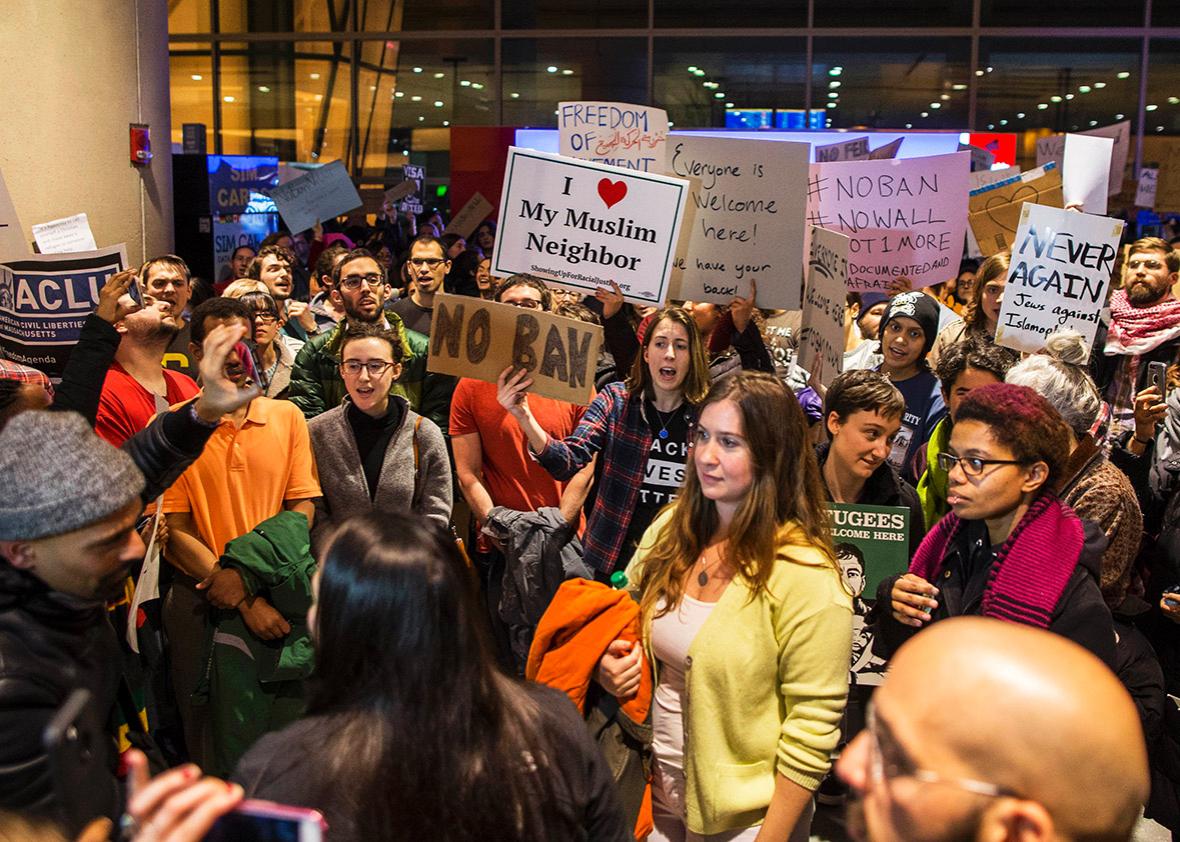 Protestors rally at a demonstration against the new ban on immigration issued by President Donald Trump at Logan International Airport on January 28, 2017 in Boston, Massachusetts. 