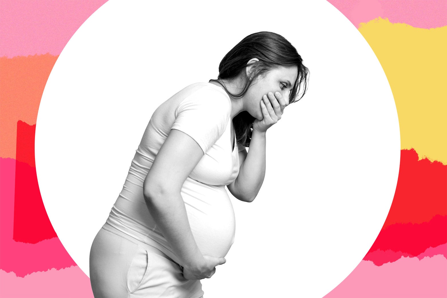 A pregnant person covers her mouth, as if sick.