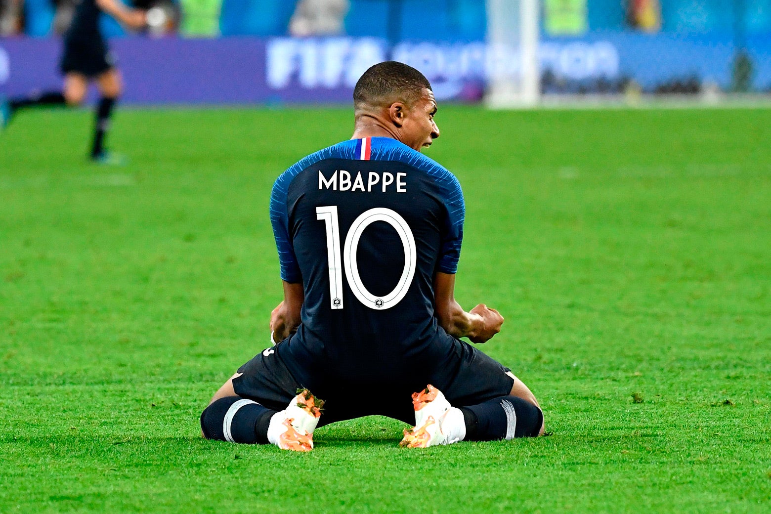 Kylian Mbappe celebrates at the end of the World Cup semifinal football match between France and Belgium in Saint Petersburg on July 10.