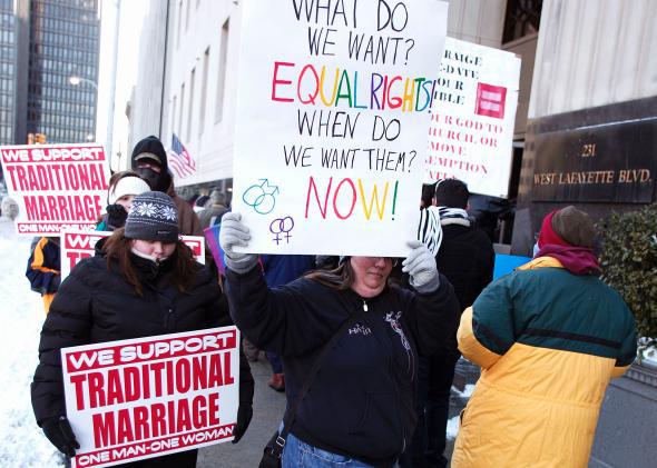 Supporters of gay marriage alongside opponents outside the courthouse in Detroit, where it's very cold in March. 