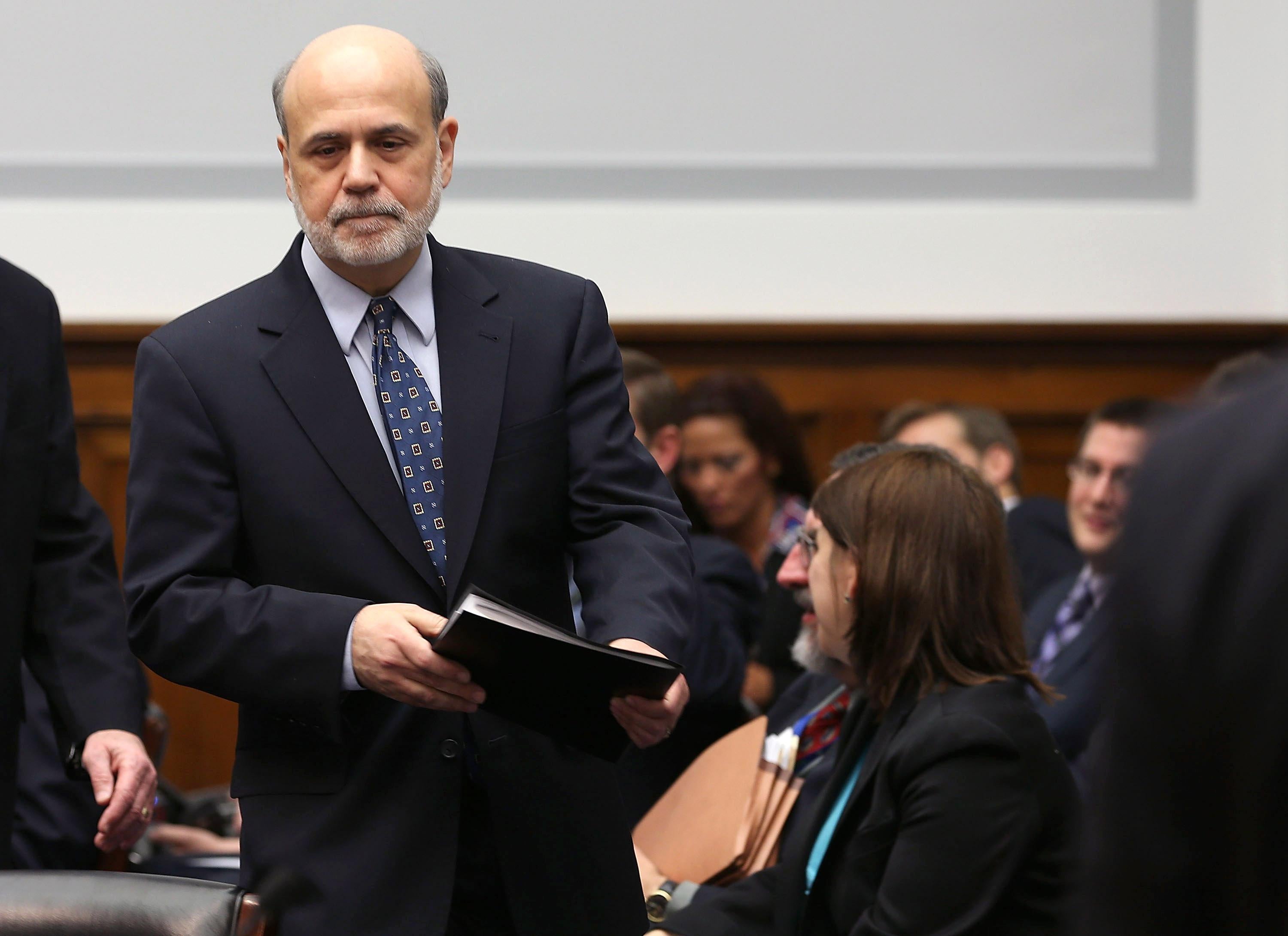 Federal Reserve Board Chairman Ben Bernanke arrives at a House Financial Services Committee hearing on Capitol Hill, Feb. 27, 2013.