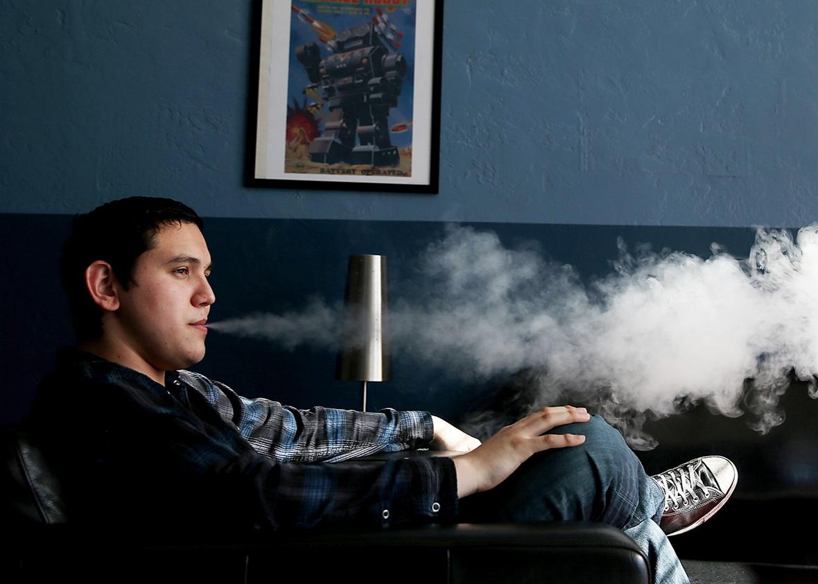 A customer smokes an e-cigarette at Digital Ciggz on Jan. 28, 2015, in San Rafael, California.